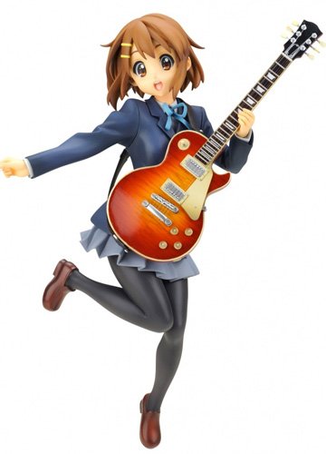 My first real figurine, Yui Hirasawa from K-ON! Puts a smile on my